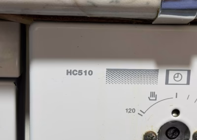 Panel de mandos HC510 con reloj y termostato, por donde empieza el diagnóstico al reparar un horno